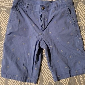 Blue shorts with grey skulls